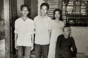 (L to R)Unknown family friend, Le-Hong’s father, sister, and grandmother, date unknown, Vietnam